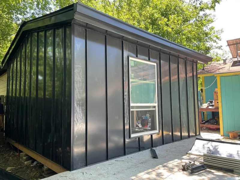 Black standing seam metal wall panels for Roof Inspection in Maysville