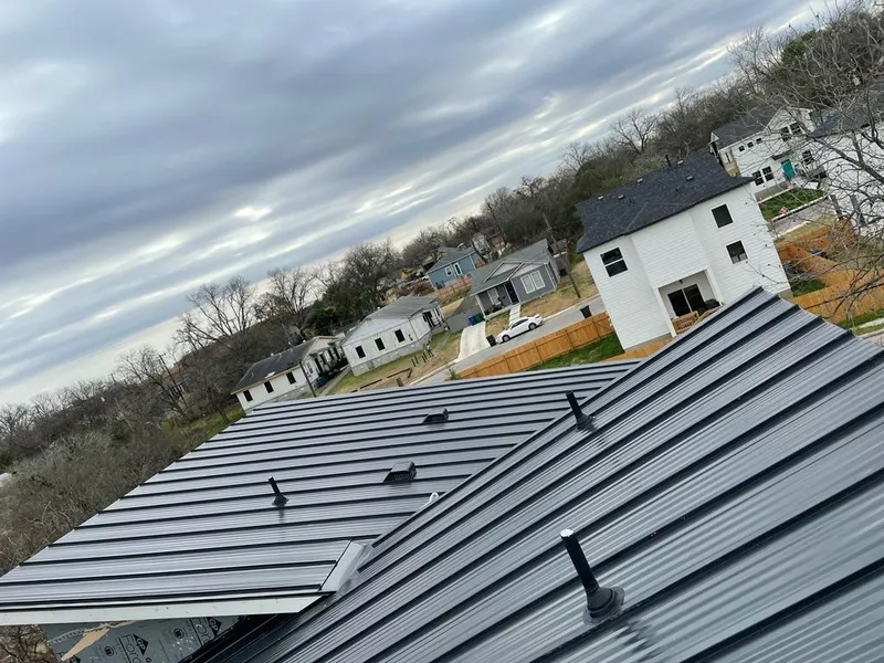 Standing seam metal roof panels with vents for Skylight Repair in Maysville